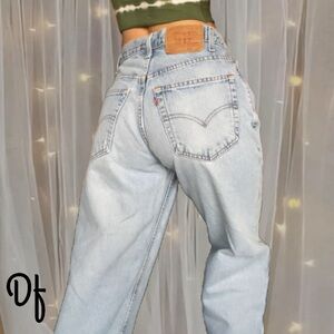 VTG Levi’s 570 Light Blue Denim Jeans size 30 Waist